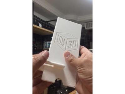 Suporte para celular com saída para cabo