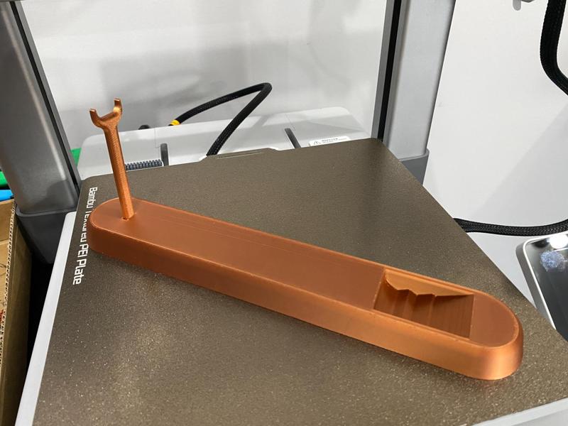 Display stand for Batman Grappler Gun.