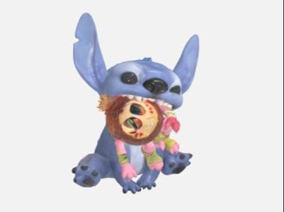 Stitch holding stuffed animal from Lilo and Stitch