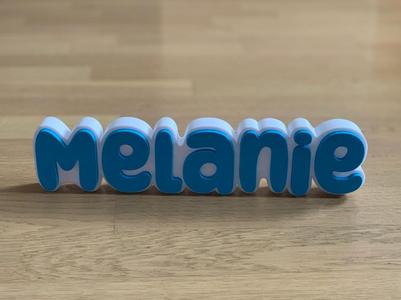 Melanie Name Tag