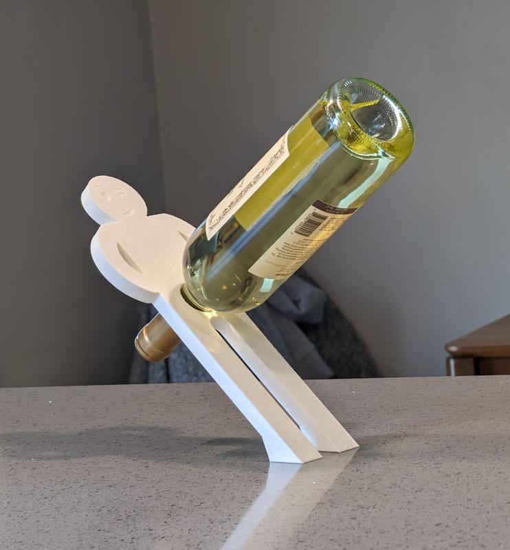Balancing wine bottle holder gag gift