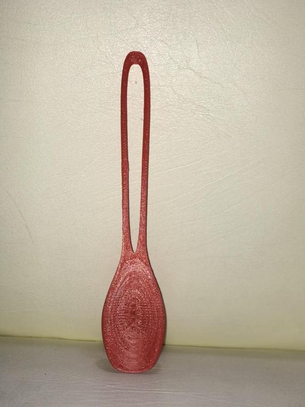 Vaso de proteinas y cuchara.