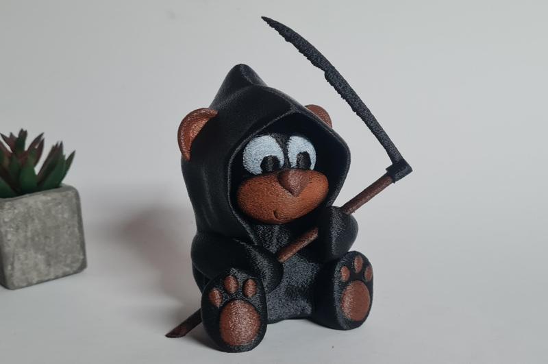 Cute halloween grim reaper bear