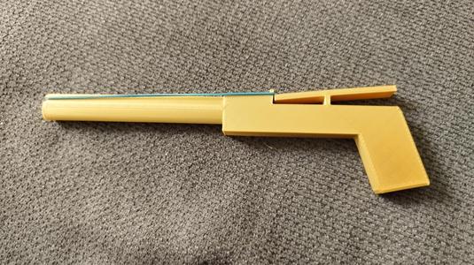 Plastic Toy Pistol - Shoot Hair Ties with Precision!