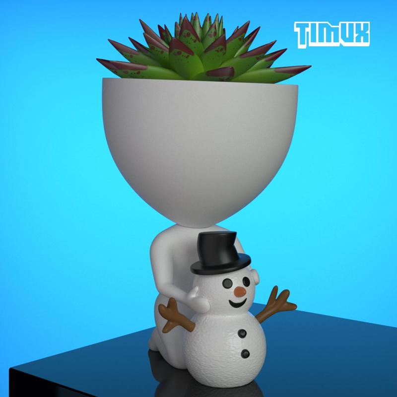 ROBERT PLANT MAKING A SNOWMAN