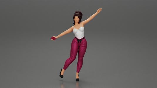 Happy Young Woman in pants Standing on One Leg holding phone