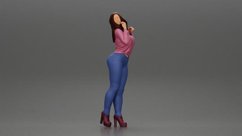 Beautiful girl in jeans and shirt posing
