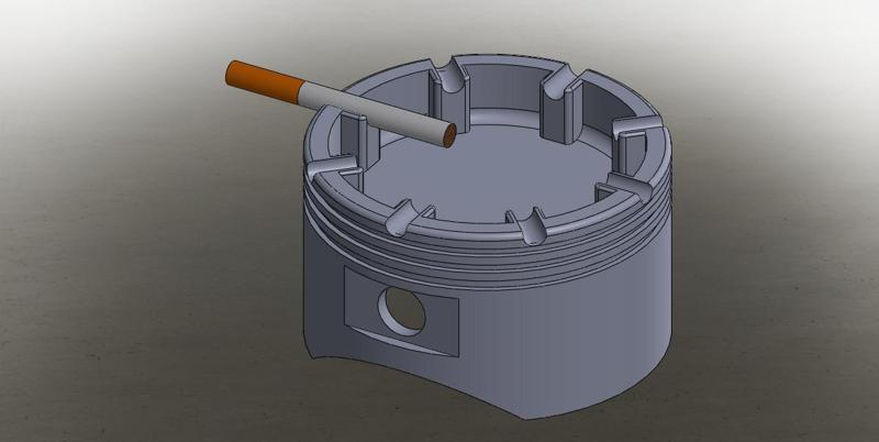 Piston-shaped ashtray.