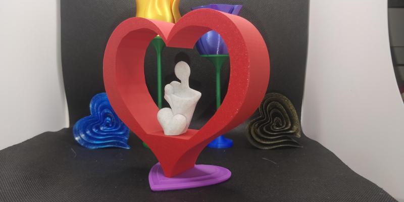 Heart with mother and child sculpture