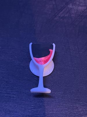 Croc charm glass of wine