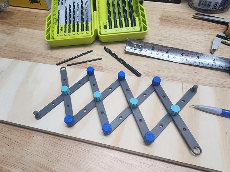 Adjustable Hole Spacing Drill Guide