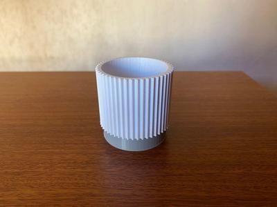 Pot with removable plate