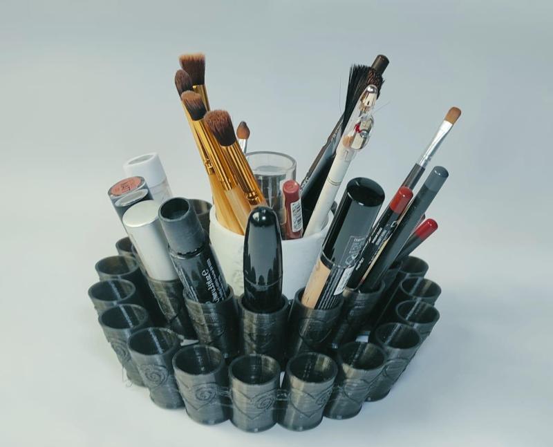 Swiveling lipstick and makeup stand