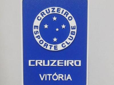 Cruzeiro shield plate with person's name on the model