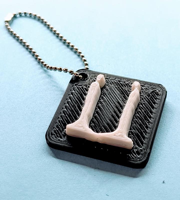 G-Dragon "ÜBERMENSCH" Keychain