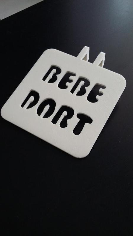 Door handle sign "Bébé dort"