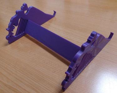 Irish harp shaped stand for a laptop