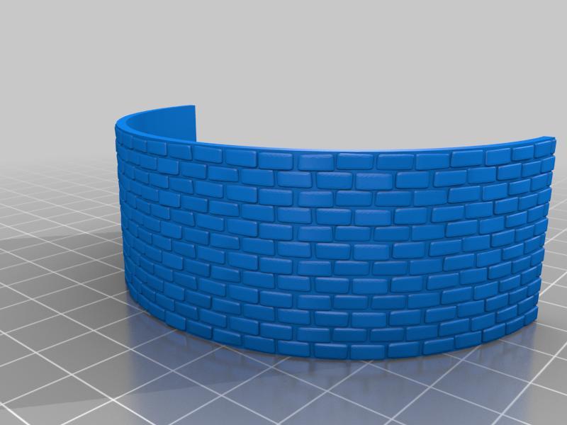 Curved brick wall for spool display