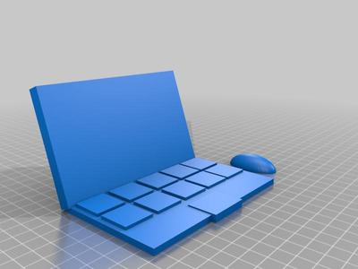 Computer with tilted screen and mouse 