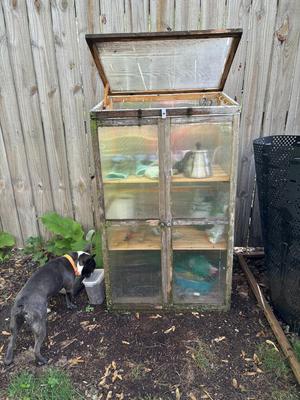 Greenhouse toggle door