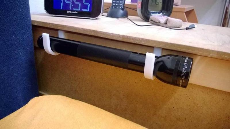 Mag-Lite holder for bed or nightstand