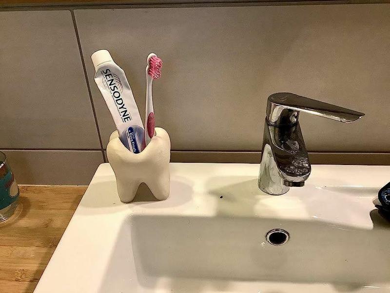 Carious tooth pot