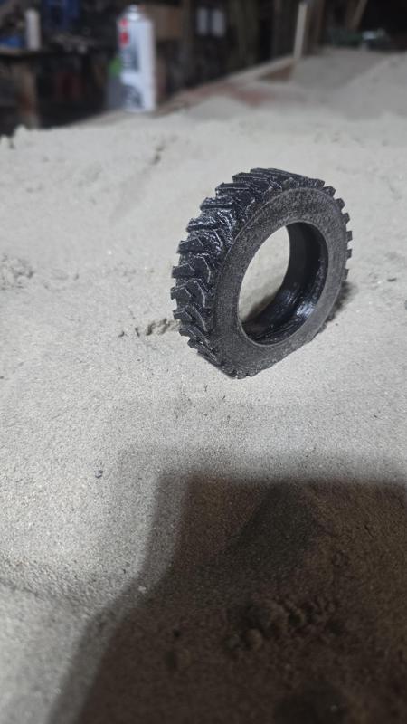 Excavator tire + rim