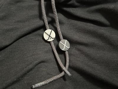 Hockey Puck with Crossing Sticks Drawsting Bead