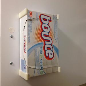 Wall mounted dryer sheet holder