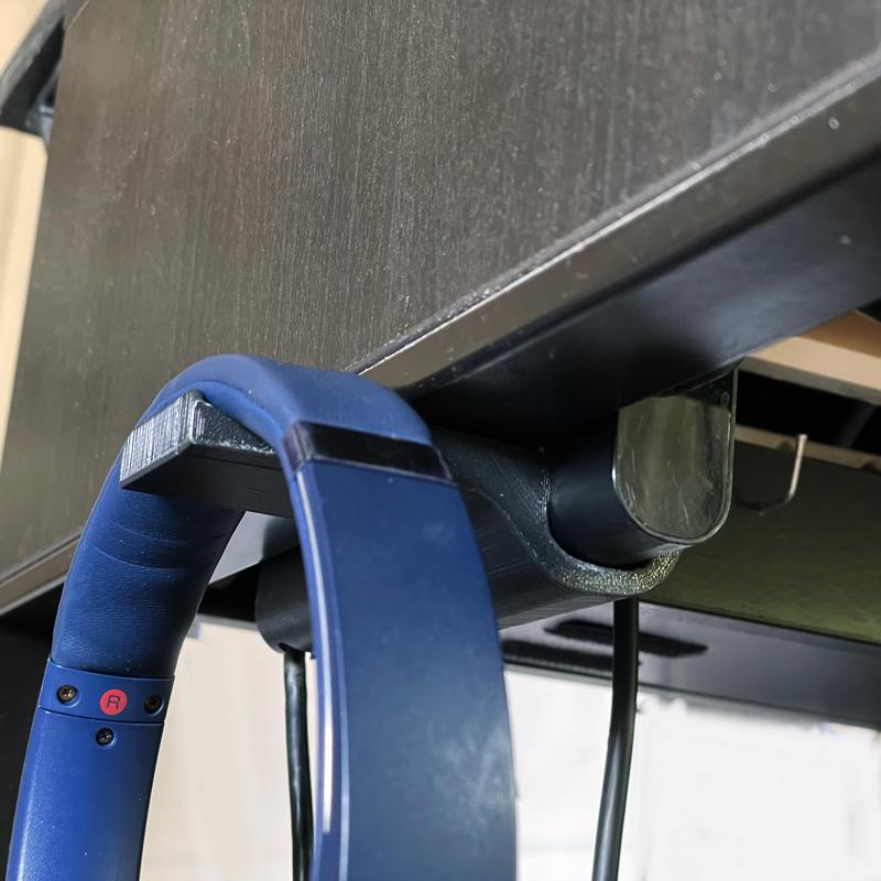 Headphones and Dell Laptop charger holder - Ikea table