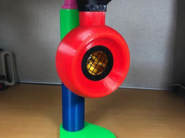 Portable motor powered siren