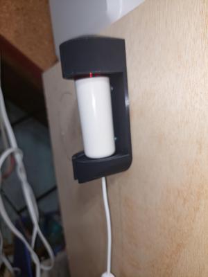 Wall mount holder for USB bag vacuum.