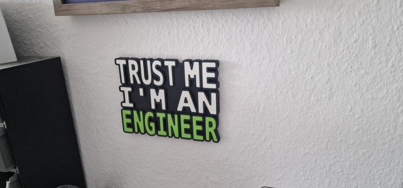 Funny "TRUST ME I'M AN ENGINEER" slogan as illuminated board / sign