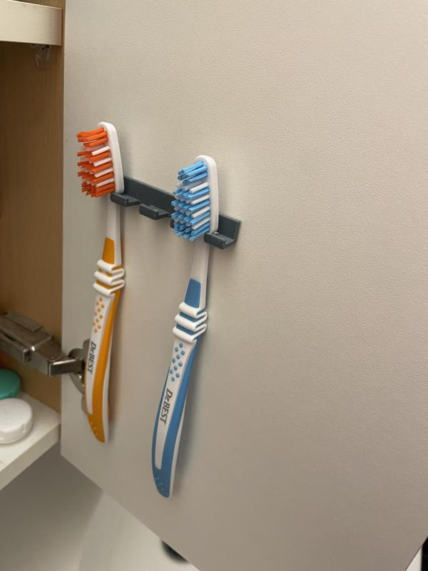 Toothbrush hook/holder