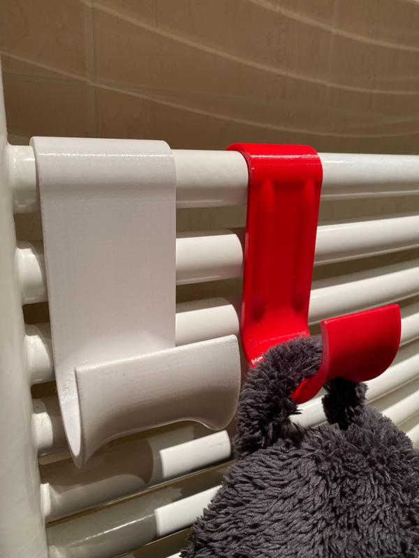 Tube radiator coat hook