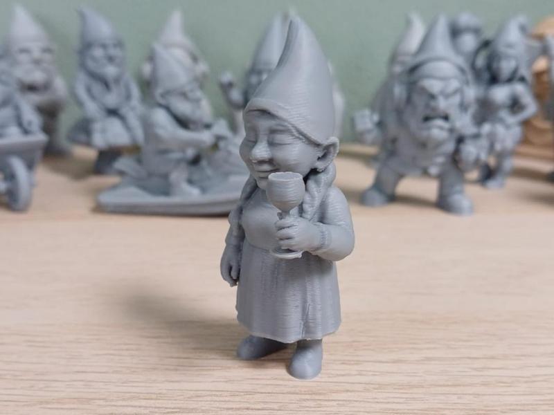 Gnomette drinking wine