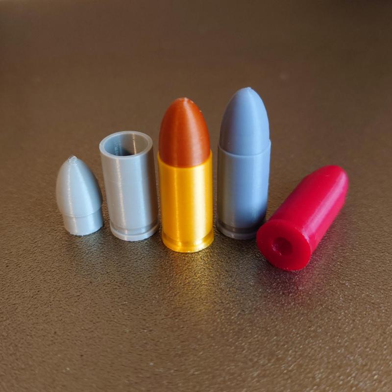 9mm Luger replica and snap cap