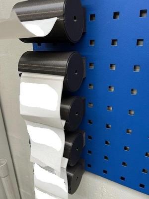 Etiketten Abroller für Lochwand