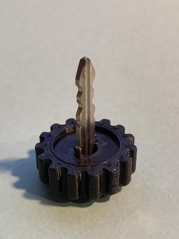 Motorcycle saddle bag key knob