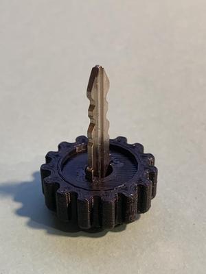 Motorcycle saddle bag key knob