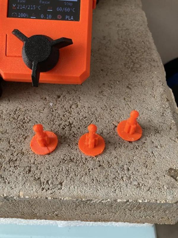 Fastener plug for a Subaru car.   