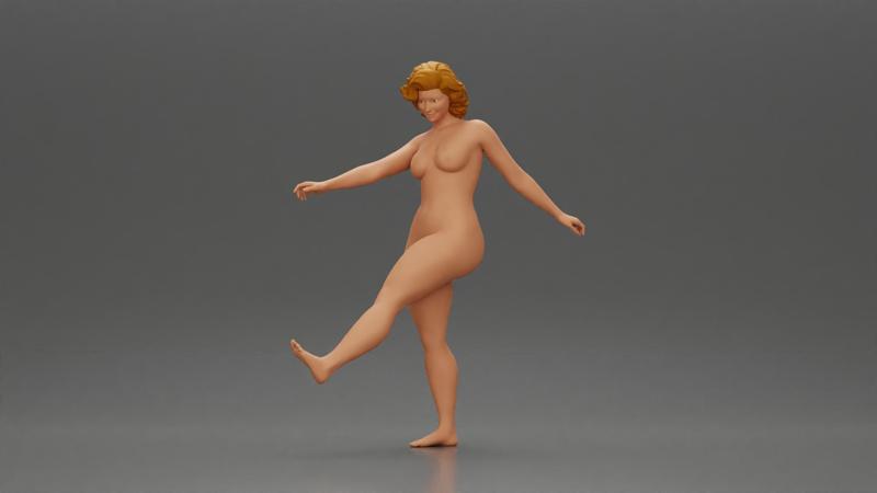 Naked Woman joyfully kicks her leg with energy