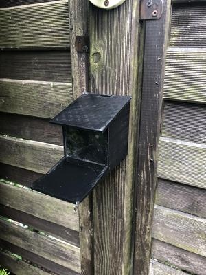 Squirrel feeder house