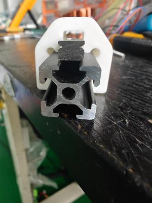 Guides for mounting linear guides on aluminum profiles