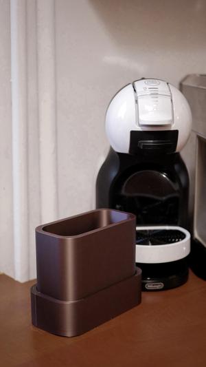 Container for used coffee capsules