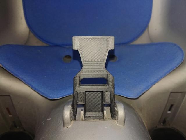 Clips for child's bike seat harness