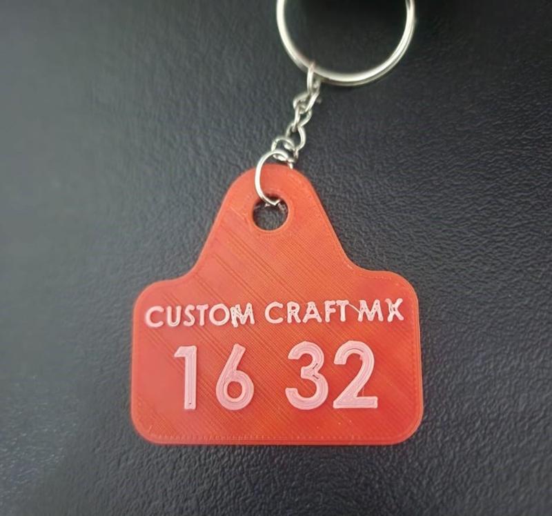 Identificador llavero vaca