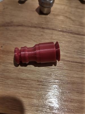 Omnidirectional spraying nozzle with Gardena connector