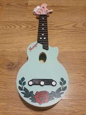 Hex Ukulele body with flower wreath and name