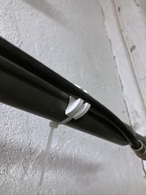 Clip for 10mm coaxial cable and 38mm antenna mast tube